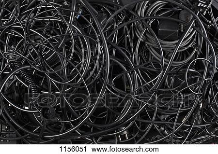 A mess of tangled black cords and cables View Large Photo Image Stock Image - A mess of tangled black cords and cables. Fotosearch