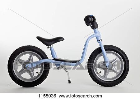 A miniature toy bicycle View Large Photo Image Stock Photograph - A miniature toy bicycle. Fotosearch