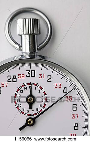 Stock Photograph - A moving stopwatch, close-up. Fotosearch