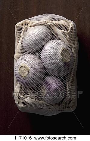 A net bag of onions View Large Photo Image Stock Photograph - A net bag of onions. Fotosearch