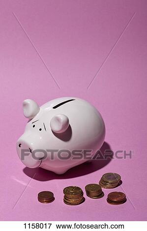 A piggy bank and stacks of European Union coins View Large Photo Image Stock Photo - A piggy bank and stacks of European Union coins. Fotosearch