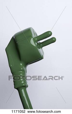 Stock Image - A plug and cable painted green. Fotosearch