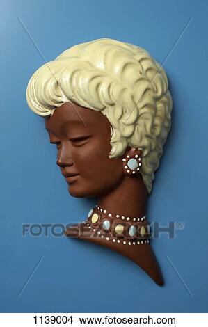 A retro wall hanging of a woman with short blond hair View Large Photo Image Picture - A retro wall hanging of a woman with short blond hair. Fotosearch