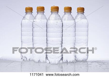 A row of five full plastic water bottles arranged in a pyramid View Large Photo Image Stock Image - A row of five full plastic water bottles arranged in a pyramid. Fotosearch