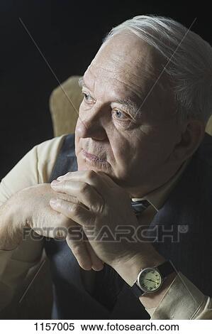 Stock Photography - A senior man looking away. Fotosearch