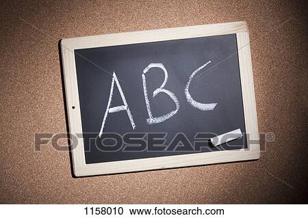 Stock Image - A small chalkboard with the letters, A, B and C handwritten on it. Fotosearch