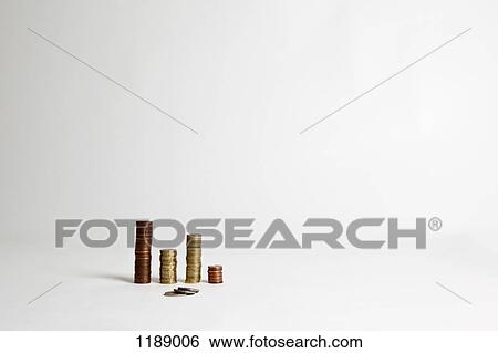 A small pile of European Unions coins in front of several neat stacks of coins View Large Photo Image Stock Photograph - A small pile of European Unions coins in front of several neat stacks of coins. Fotosearch