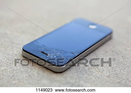 A smart phone with a cracked screen View Large Photo Image Stock Image - A smart phone with a cracked screen. Fotosearch