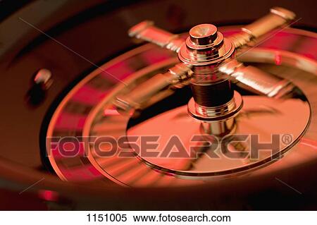 A spinning roulette wheel View Large Photo Image Stock Photography - A spinning roulette wheel. Fotosearch