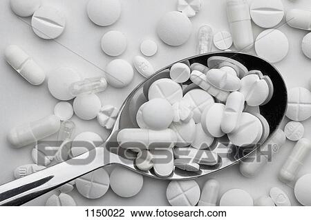 A spoon full of various white pills and capsules View Large Photo Image Stock Image - A spoon full of various white pills and capsules. Fotosearch