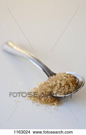 Picture - A spoonful of sugar. Fotosearch