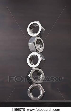 A stack of five metal nuts View Large Photo Image Stock Image - A stack of five metal nuts. Fotosearch