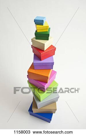 Stock Image - A stack of multi colored gift boxes. Fotosearch