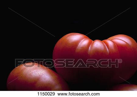 A stack of ripe tomatoes, close-up View Large Photo Image Stock Photo - A stack of ripe tomatoes, close-up. Fotosearch