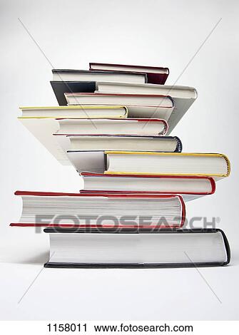 A stack of various hardcover books, diminishing perspective View Large Photo Image Stock Image - A stack of various hardcover books, diminishing perspective. Fotosearch