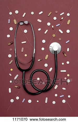 A stethoscope lying amongst various pills View Large Photo Image Stock Image - A stethoscope lying amongst various pills. Fotosearch