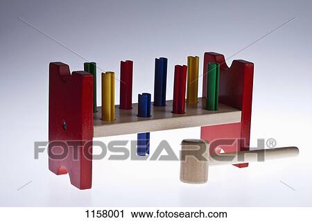 A toy hammer and work bench View Large Photo Image Stock Image - A toy hammer and work bench. Fotosearch