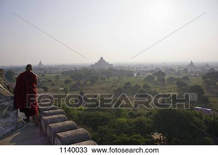 A view of the temples of Bagan, Burma and a Buddhist monk View Large Photo Image Stock Image - A view of the temples of Bagan, Burma and a Buddhist monk . Fotosearch
