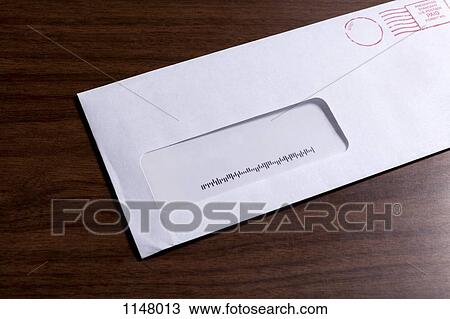 A window envelope with no address, but a barcode and red ink postage stamp View Large Photo Image Stock Image - A window envelope with no address, but a barcode and red ink postage stamp. Fotosearch
