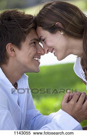 A young couple face to face View Large Photo Image Stock Photography - A young couple face to face. Fotosearch