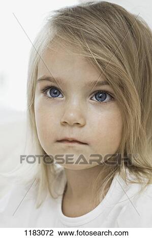 A young girl with a wet cheek from crying View Large Photo Image Stock Image - A young girl with a wet cheek from crying. Fotosearch