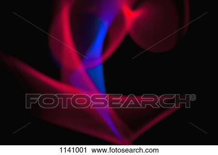 Stock Image - Abstract patterns of blue and red light on a black background. Fotosearch
