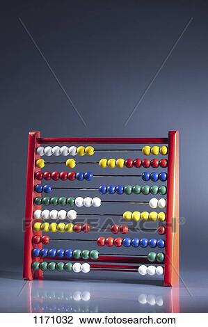 An abacus with multi colored wooden beads View Large Photo Image Stock Image - An abacus with multi colored wooden beads. Fotosearch