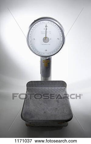An old-fashioned, empty kitchen scale View Large Photo Image Stock Photo - An old-fashioned, empty kitchen scale. Fotosearch