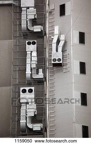 Anthropomorphic air vents on side of building View Large Photo Image Stock Image - Anthropomorphic air vents on side of building. Fotosearch