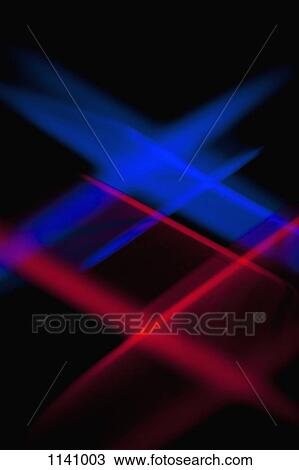Blue and red lights crisscrossing against a black background View Large Photo Image Stock Image - Blue and red lights crisscrossing against a black background. Fotosearch