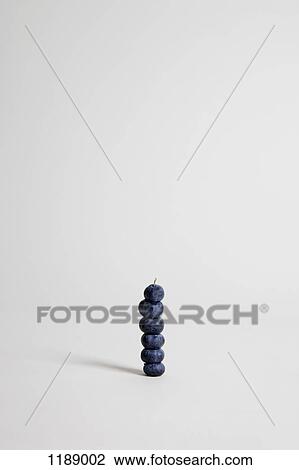 Blueberries arranged into a stack, studio shot View Large Photo Image Stock Image - Blueberries arranged into a stack, studio shot. Fotosearch