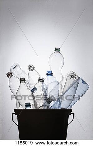 Bottles in bucket View Large Photo Image Stock Photo - Bottles in bucket. Fotosearch