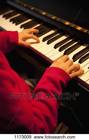 Child piano player View Large Photo Image Stock Photo - Child piano player . Fotosearch