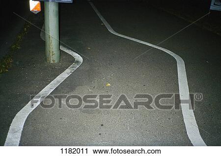 Stock Image - Curving bicycle lane. Fotosearch