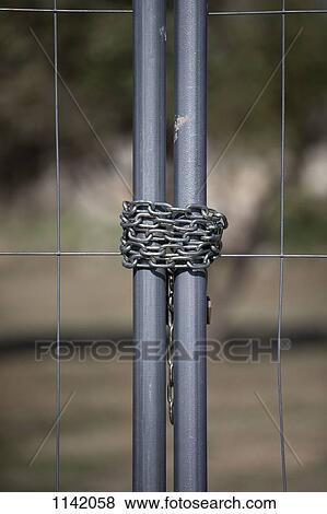 Detail of a chain on a metal gate View Large Photo Image Stock Photo - Detail of a chain on a metal gate. Fotosearch