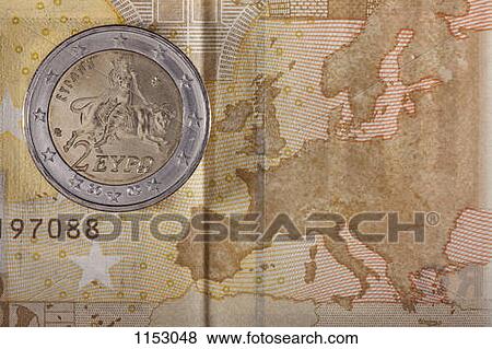 Detail of a fifty Euro banknote with a two Euro coin on top of it View Large Photo Image Stock Photo - Detail of a fifty Euro banknote with a two Euro coin on top of it. Fotosearch