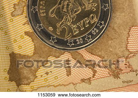 Detail of a fifty Euro banknote with a two Euro coin on top of it View Large Photo Image Stock Photo - Detail of a fifty Euro banknote with a two Euro coin on top of it. Fotosearch