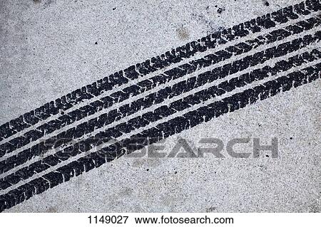 Detail of a tire mark on concrete View Large Photo Image Stock Photo - Detail of a tire mark on concrete. Fotosearch
