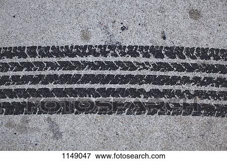 Detail of a tire mark on concrete View Large Photo Image Stock Photo - Detail of a tire mark on concrete. Fotosearch