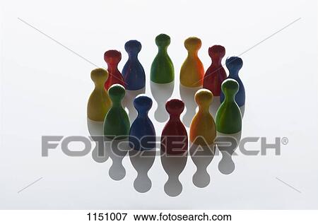 Different colored game pieces arranged in a circle View Large Photo Image Stock Photo - Different colored game pieces arranged in a circle. Fotosearch