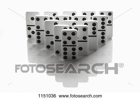 Dominoes arranged in the shape of a triangle View Large Photo Image Stock Photograph - Dominoes arranged in the shape of a triangle. Fotosearch