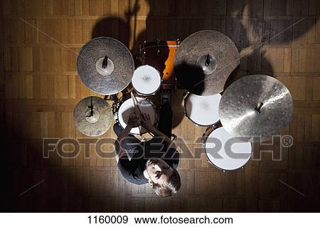 Drummer looks up View Large Photo Image Stock Photo - Drummer looks up. Fotosearch