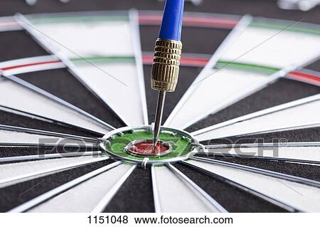 Extreme close up of a dart in a bull's eye View Large Photo Image Stock Photo - Extreme close up of a dart in a bull's eye. Fotosearch