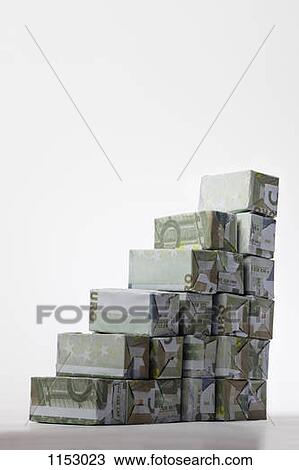 Five Euro banknotes folded into rectangular boxes and arranged into a staircase View Large Photo Image Stock Image - Five Euro banknotes folded into rectangular boxes and arranged into a staircase. Fotosearch