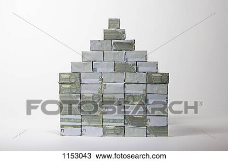 Five Euro banknotes folded into rectangular boxes and stacked into a pyramid View Large Photo Image Stock Image - Five Euro banknotes folded into rectangular boxes and stacked into a pyramid. Fotosearch