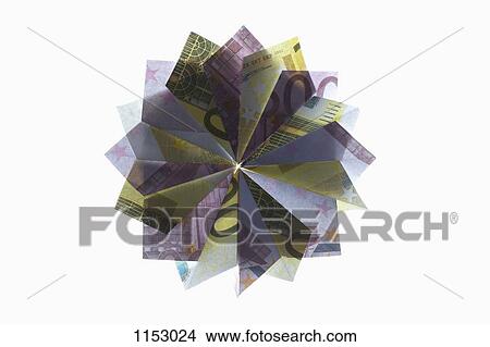 Five hundred Euro bills and two hundred Euro bills folded into a pinwheel shape View Large Photo Image Picture - Five hundred Euro bills and two hundred Euro bills folded into a pinwheel shape. Fotosearch