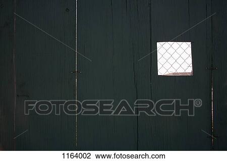 Forced perspective of small wire mesh section of fence View Large Photo Image Stock Image - Forced perspective of small wire mesh section of fence. Fotosearch