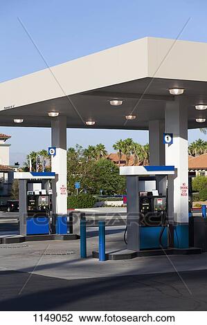 Fuel pumps at a gas station View Large Photo Image Stock Image - Fuel pumps at a gas station. Fotosearch