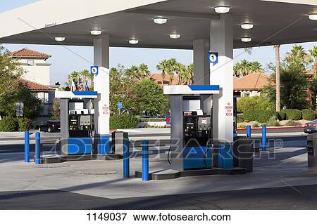 Stock Photo - Fuel pumps at a gas station. Fotosearch