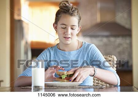 Girl ready to eat sandwich View Large Photo Image Stock Photograph - Girl ready to eat sandwich. Fotosearch